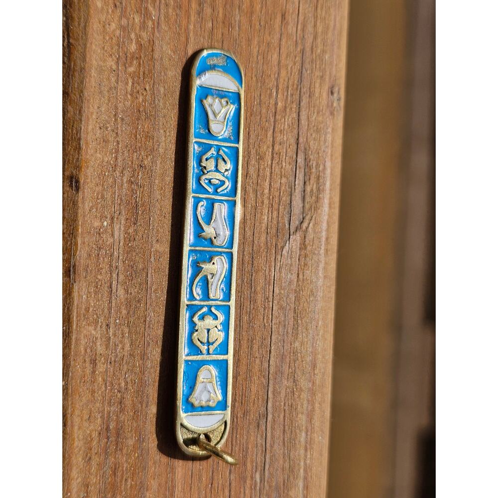 handmade cyan cartouche pendant